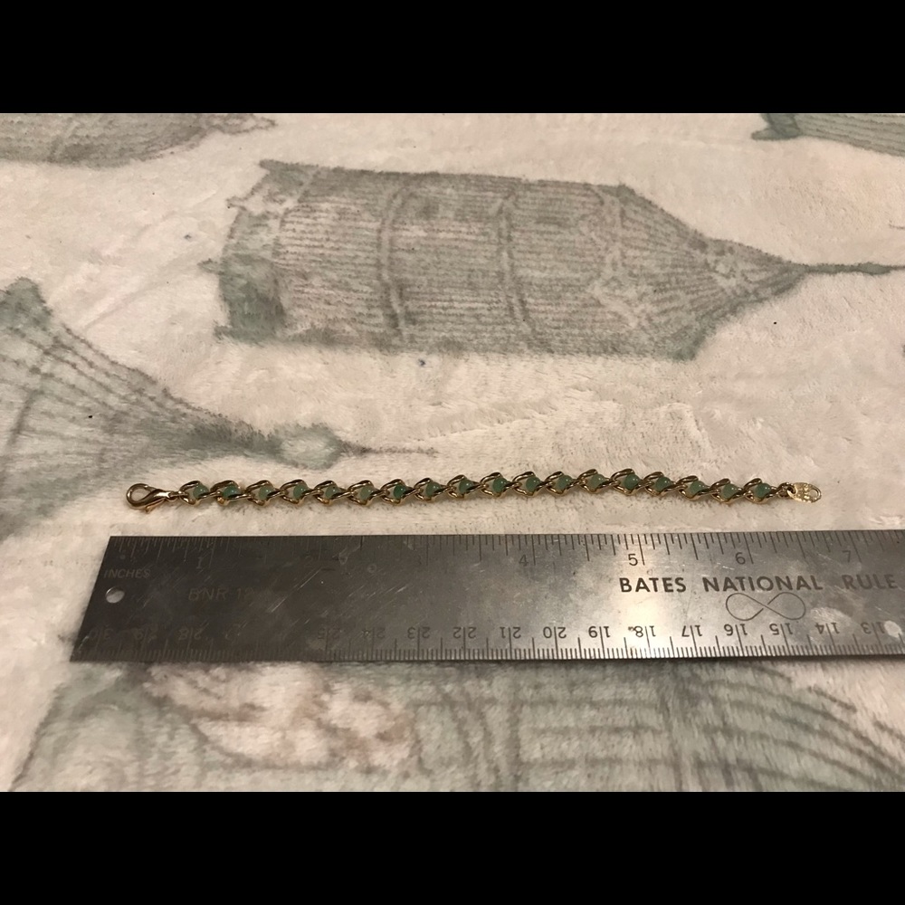 Gold and green gem bracelet